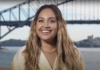 Photograph of Jess Mauboy in front of the Sydney Harbour Bridge